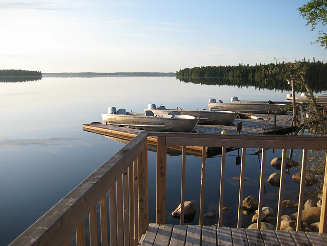 This is a photo of the boats at the dock from the bacany of the cottage