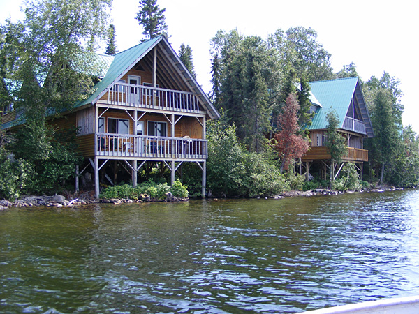 This is a photo of two cottages facing the lake