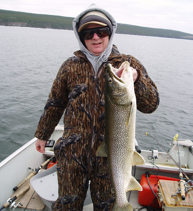 This is a photo of a man holding a 14 pound Lake Trout