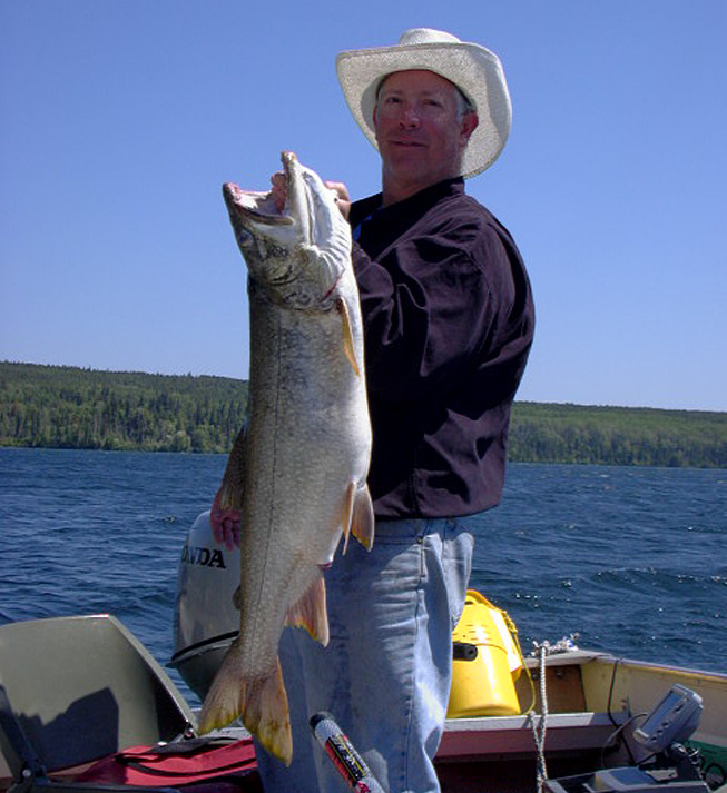 This is a photo of a man holding a 15 pound Lake Trout